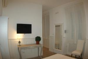 TV a/nebo společenská místnost v ubytování Alba Sul Vaticano