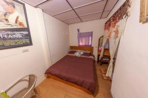 Postel nebo postele na pokoji v ubytování Wangyuku B&B