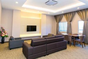 TV a/nebo společenská místnost v ubytování Icon Hotel Segamat