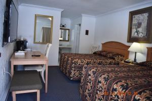 Krevet ili kreveti u jedinici u okviru objekta Evening Star Motel