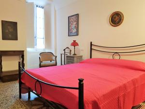 מיטה או מיטות בחדר ב-Pieve Holiday - Maison de Charme