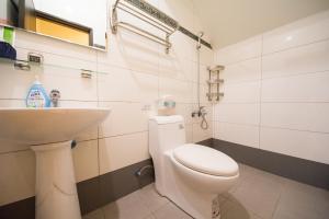 Een badkamer bij Childlike B&B