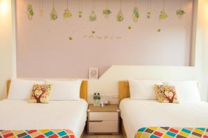 Een bed of bedden in een kamer bij Childlike B&B