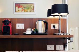 Set per la preparazione di tè e caffè presso Piazza Venezia Grand Suite