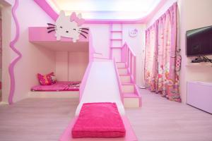 Een bed of bedden in een kamer bij Childlike B&B