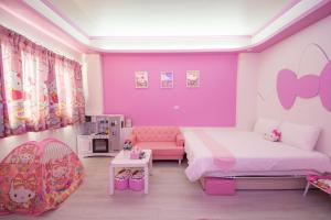 Een bed of bedden in een kamer bij Childlike B&B