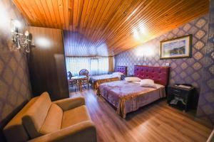 Postel nebo postele na pokoji v ubytování Kosk Hotel Kadikoy