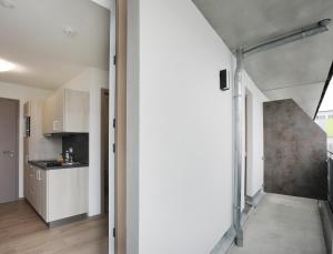 Kuchyň nebo kuchyňský kout v ubytování Apartment Hotel 37