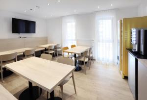 TV a/nebo společenská místnost v ubytování Apartment Hotel 37