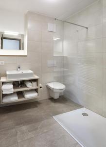 Koupelna v ubytování Apartment Hotel 37