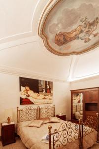 En eller flere senger på et rom på Residenza storica Volta della Morte