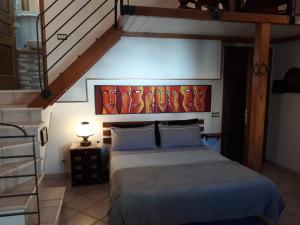A bed or beds in a room at La Villa