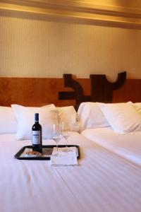 Postel nebo postele na pokoji v ubytování Hotel Olid
