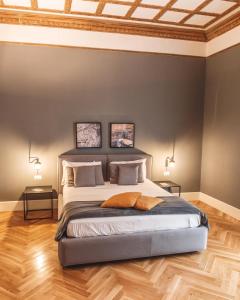 A bed or beds in a room at Relais Della Porta
