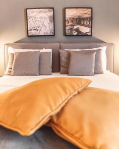 A bed or beds in a room at Relais Della Porta