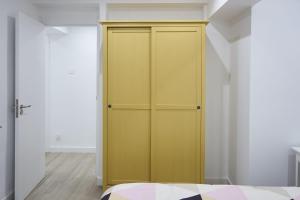 Postel nebo postele na pokoji v ubytování Foncalada 13