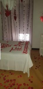 Postel nebo postele na pokoji v ubytování Hostal Lima