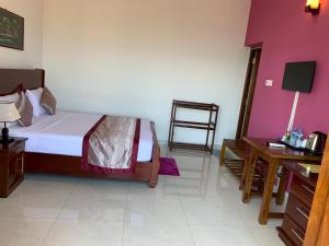 Voodi või voodid majutusasutuse Serenity Hill Oasis toas