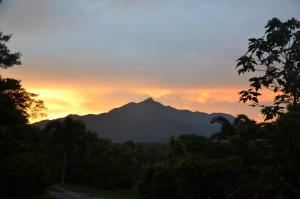 a mountain range with a sky background at Epiphyte B & B in Cape Tribulation