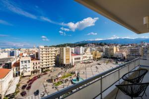 a view of a city from a balcony at King George Sq. Flat - Absolute City Center in Patra