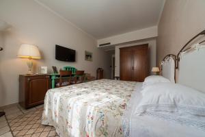 Letto o letti in una camera di Albergo La Primula