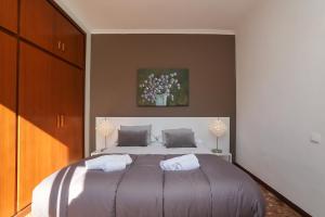 Posteľ alebo postele v izbe v ubytovaní DIFFERENTFLATS Casalmar + 24 fotografií