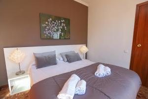 Posteľ alebo postele v izbe v ubytovaní DIFFERENTFLATS Casalmar