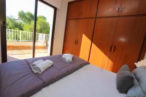 Posteľ alebo postele v izbe v ubytovaní DIFFERENTFLATS Casalmar