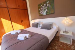 Posteľ alebo postele v izbe v ubytovaní DIFFERENTFLATS Casalmar