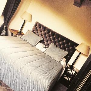 A bed or beds in a room at B&B Pieve Degli Artisti
