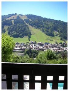 a view of a town from a balcony at RÉSIDENCE LES FAYARDS in Morzine