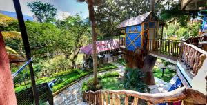 a view of a tree house in a park at Hotel Castillo Resort in San Gil