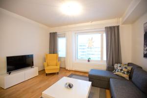 TV a/nebo společenská místnost v ubytování Majesteetti Apartments
