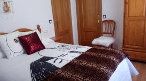 Posteľ alebo postele v izbe v ubytovaní Hostal "Los Chanos el Ruso"