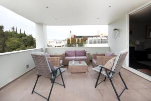 A seating area at Athens Lycabettus Hill Penthouse, Private Roof Garden & Pool