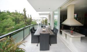 A balcony or terrace at Athens Lycabettus Hill Penthouse, Private Roof Garden & Pool