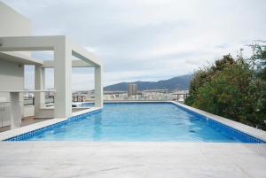 The swimming pool at or close to Athens Lycabettus Hill Penthouse, Private Roof Garden & Pool