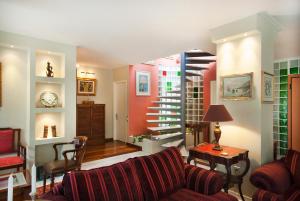 A seating area at Athens Lycabettus Hill Penthouse, Private Roof Garden & Pool