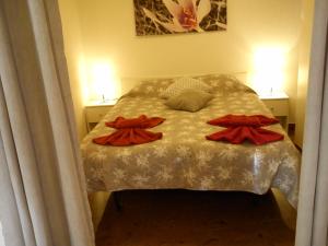 En eller flere senger på et rom på Apartment Oaza