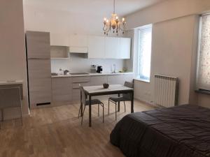 Kuchyň nebo kuchyňský kout v ubytování Residenza Vittorio Emanuele