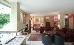 A seating area at Athens Lycabettus Hill Penthouse, Private Roof Garden & Pool
