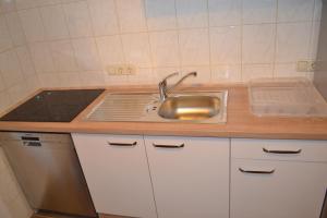 Kuchyňa alebo kuchynka v ubytovaní Apartment Holiday Lungötz + 37 fotografií