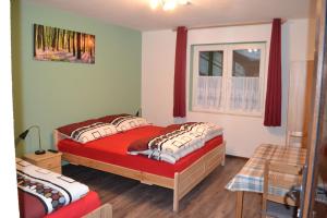 Posteľ alebo postele v izbe v ubytovaní Apartment Holiday Lungötz