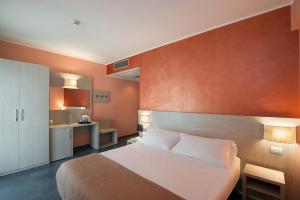 Postel nebo postele na pokoji v ubytování Hotel Testani Colleferro