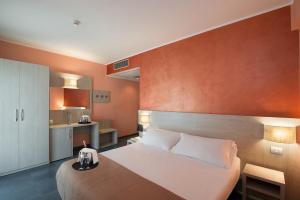 Postel nebo postele na pokoji v ubytování Hotel Testani Colleferro