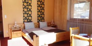Postel nebo postele na pokoji v ubytování Haus Angelika - bed & breakfast - Innsbruck/Igls