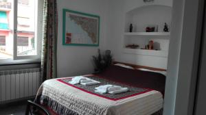 A bed or beds in a room at Fabienne