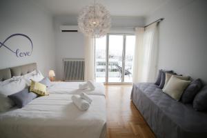 Posteľ alebo postele v izbe v ubytovaní Bluscapes Home