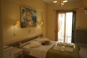 A bed or beds in a room at Nontas Home