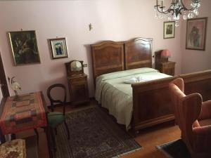 Ένα ή περισσότερα κρεβάτια σε δωμάτιο στο B&B Casa Mia